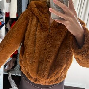 Burnt orange fur jacket. University of Tennessee